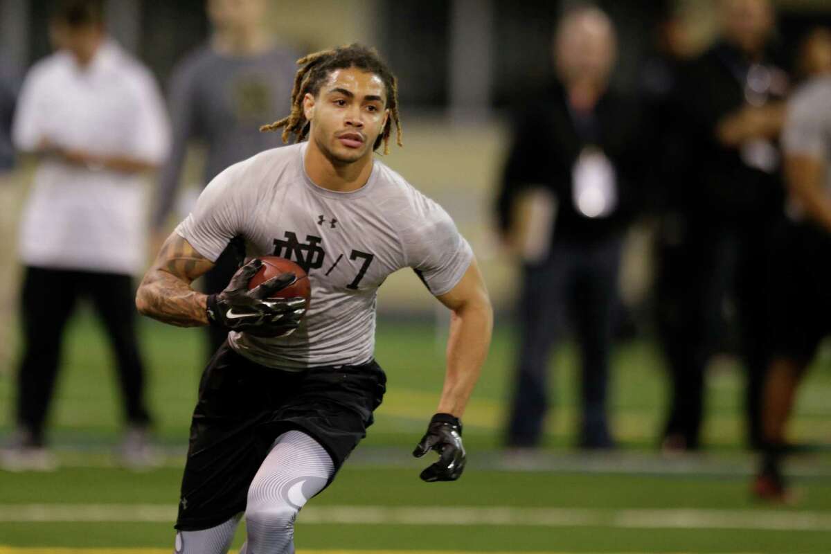 Notre Dame's Will Fuller runs a drill during Notre Dame's NFL football Pro Day in South Bend, Ind., Thursday, March 31, 2016. (AP Photo/Michael Conroy)