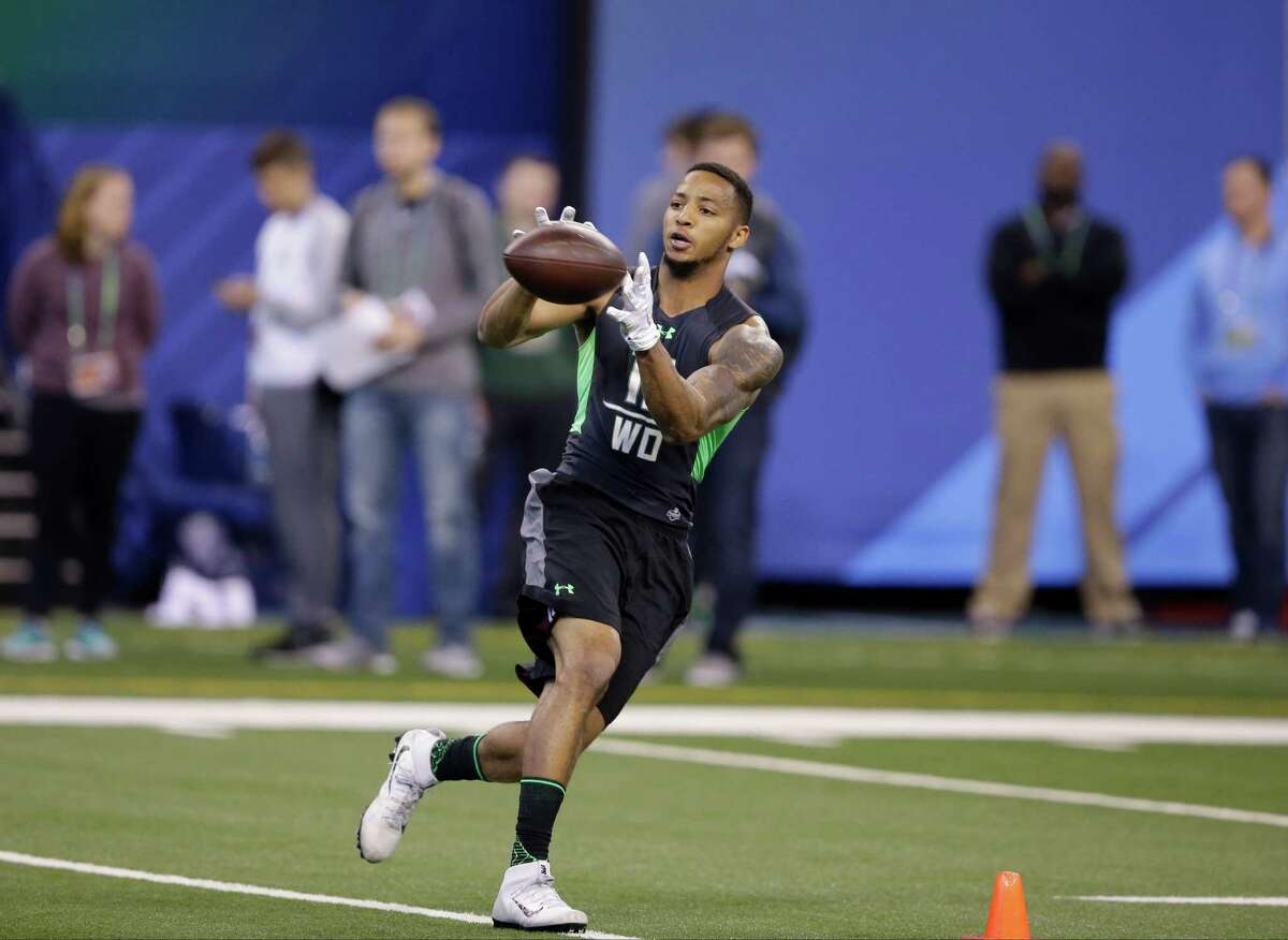 Texas Christian receiver Josh Doctson runs a drill at the NFL football scouting combine on Saturday, Feb. 27, 2016, in Indianapolis. (AP Photo/Darron Cummings)