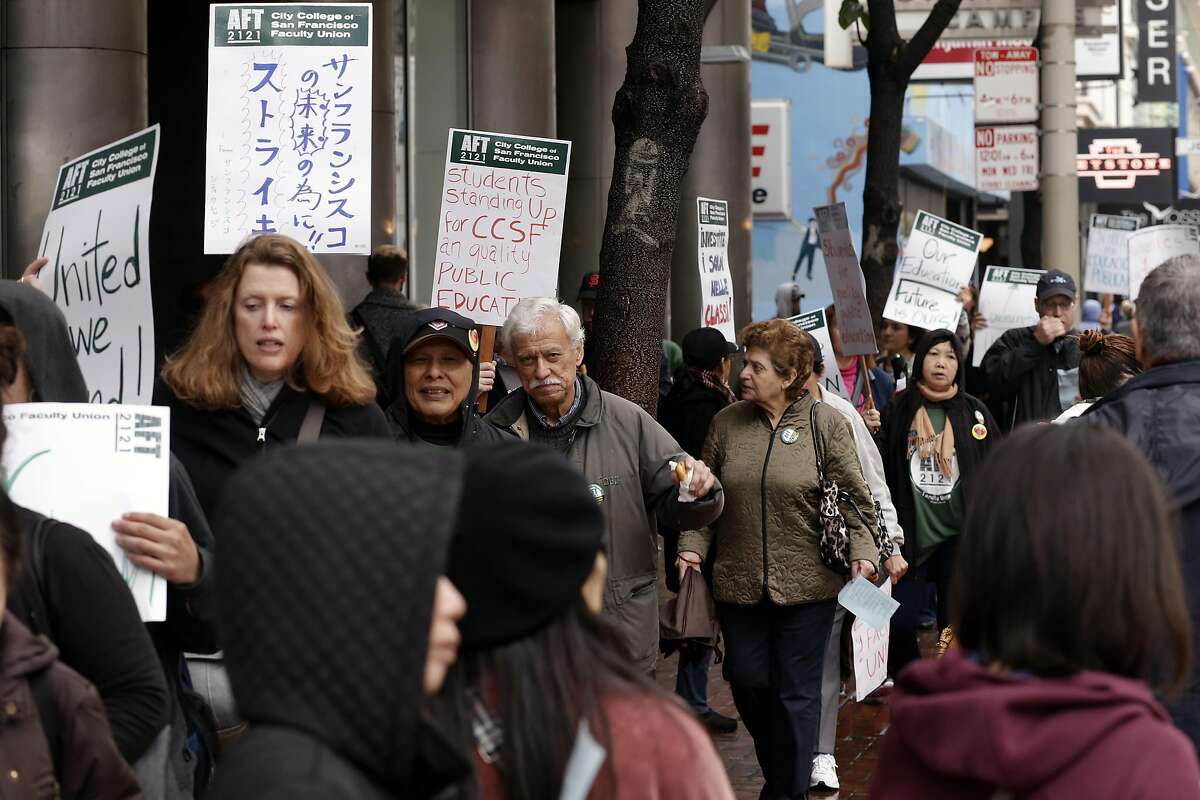 Teachers and students from the City College of San Francisco picket in front of the downtown campus building in San Francisco, California on Wed. April 27, 2016, during a one-day labor strike.