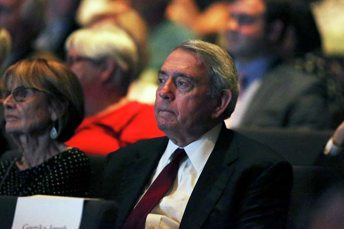 Retired newsman Dan Rather listens from several rows back in the audience as Secretary of State John Kerry answers questions from film maker Ken Burns at the LBJ Library at on April 27, 2016.