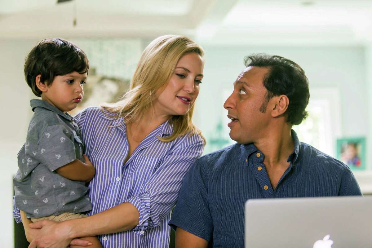 This image released by Open Road Films shows Kate Hudson and Aasif Mandvi, right, in a scene from "Mother's Day." (Ron Batzdorff /Open Road Films via AP) ORG XMIT: NYET132