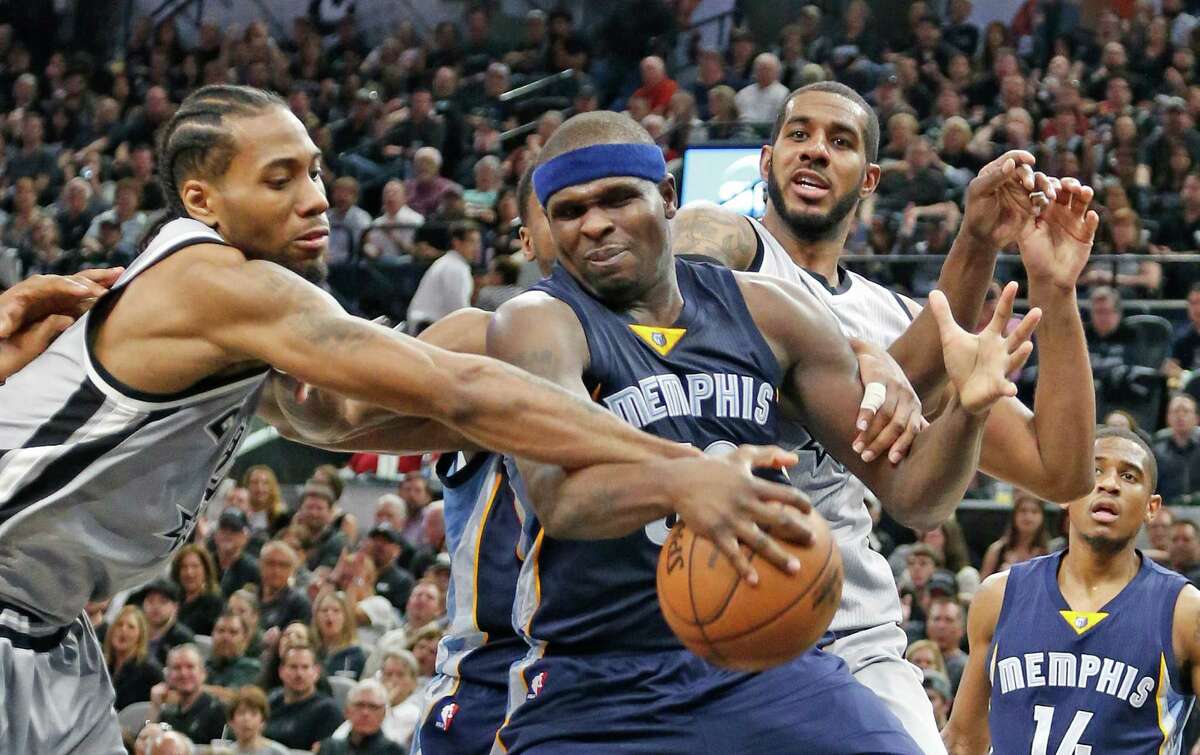 Kawhi Leonard of the Spurs tries to strip Zach Randolph of the Memphis Grizzlies of the ball in Game 1 of the Western Conference quarterfinals at the AT&T Center on April 17, 2016 in San Antonio.