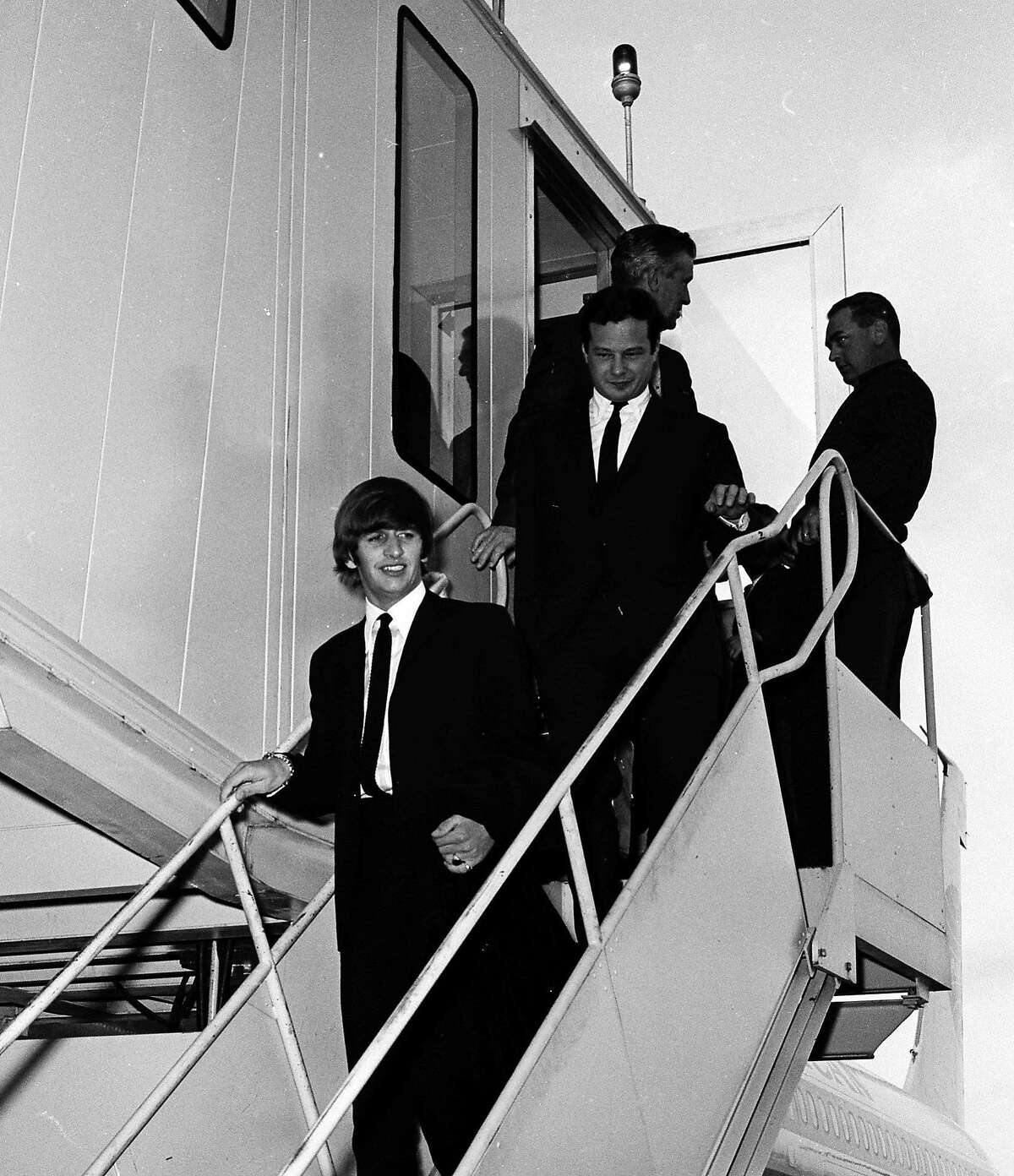 Bedlam at San Francisco International Airport as Ringo Starr of the Beatles stops here to change planes on his way to Australia to rejoin his band mates on their Australian tour