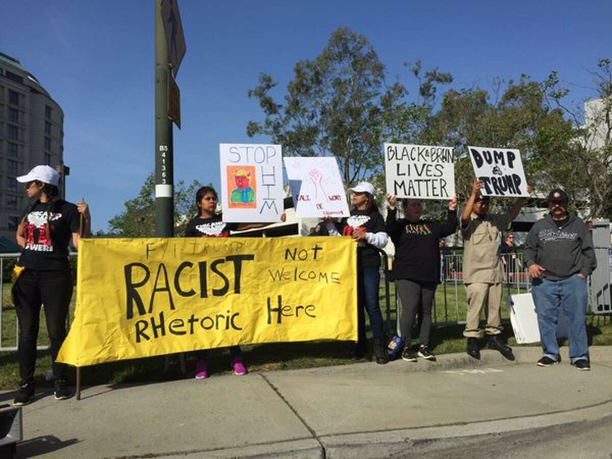 Protesters gather outside the California Republican Convention in Burlingame Friday, April 29, 2016.