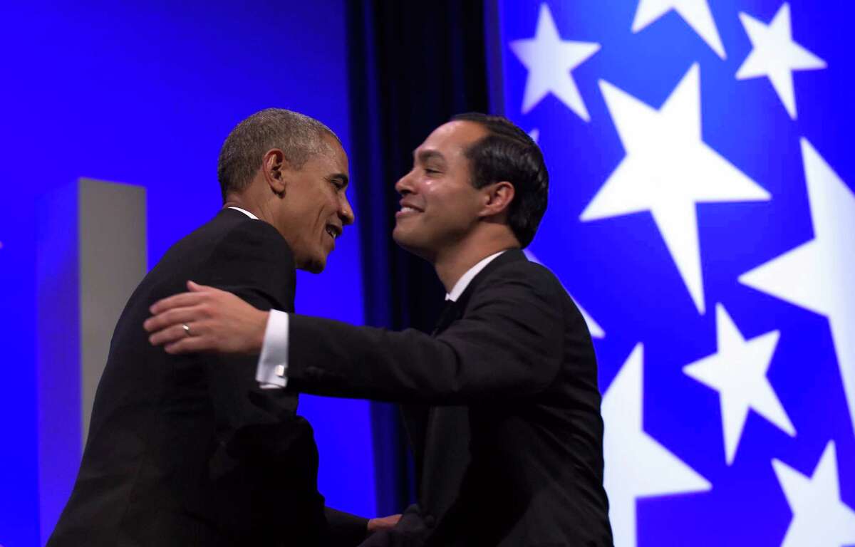 President Barack Obama, left, hugs Housing and Urban Development Secretary Julian Castro, right, as he arrives to speaks at the Congressional Hispanic Caucus Institute's (CHCI) 38th Anniversary Awards Gala in Washington, Thursday, Oct. 8, 2015. The Awards Gala is the signature event in its Hispanic Heritage Month list of events that include the Public Policy Conference. (AP Photo/Susan Walsh)