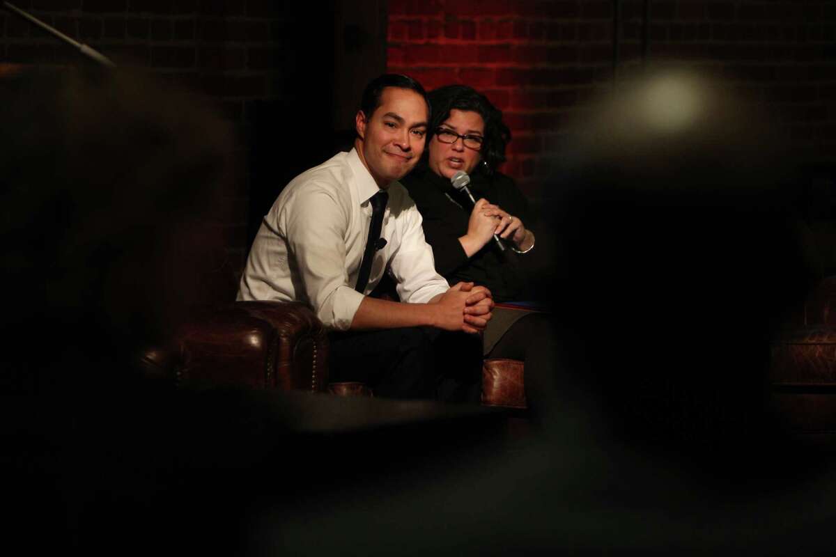 From left, US Federal Secretary of Housing and Urban Development Julian Castro and forum moderator Nicole Sanchez, V.P. of Social Impact at GitHub, speaking about his vision for #ConnectHome, in San Francisco on December 8, 2015.