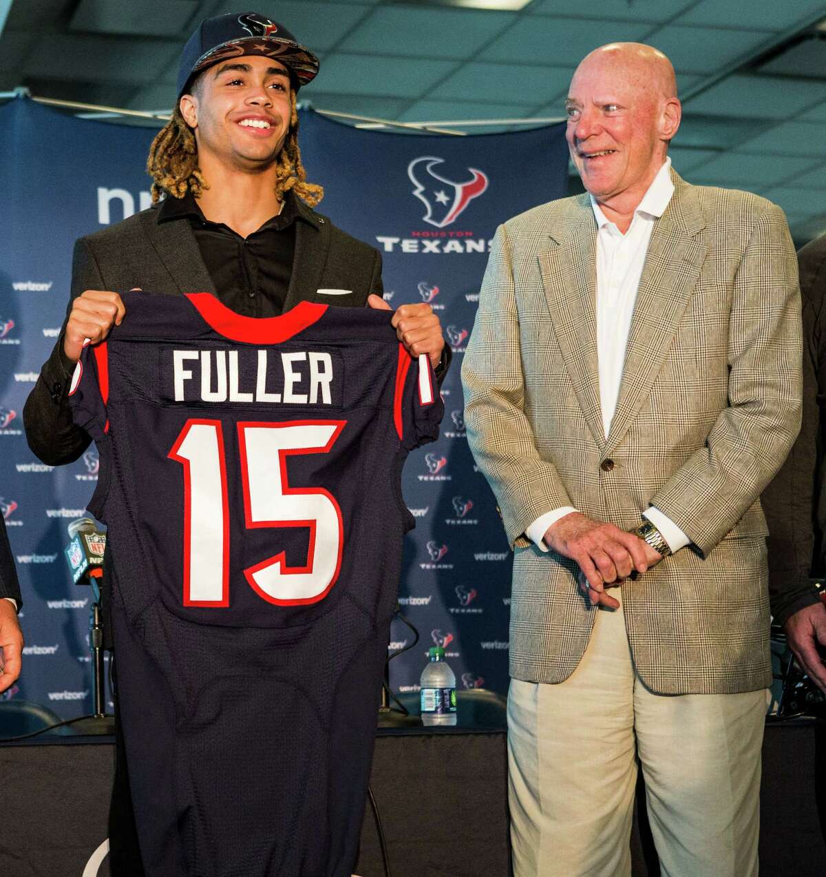Houston Texans top draft pick, Notre Dame wide receiver Will Fuller, left, stands with owner Bob McNair as he shows off his new Texans jersey during a news conference at NRG Stadium on Friday, April 29, 2016, in Houston.
