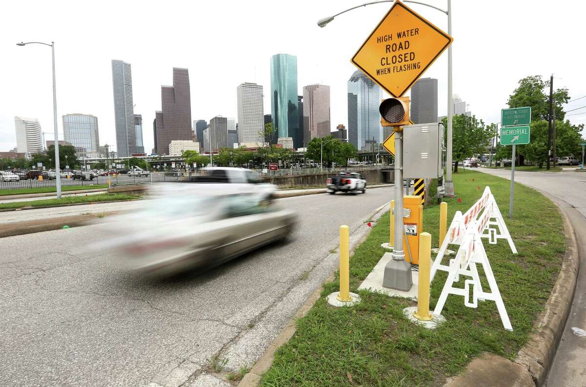 Houston prepares for storm with barricades, debris collection