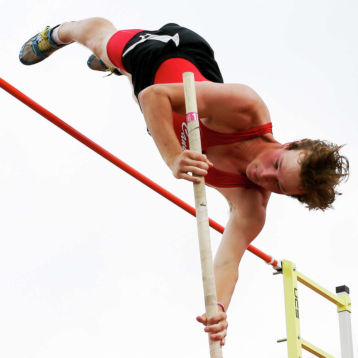 New Braunfels Canyon's Bailey Henderson clears 12 feet, 6 inches to set a new regional record in the 6A boys pole vault during the Region IV-6A track and field championships at Alamo Stadium on Friday, April 29, 2016. MARVIN PFEIFFER/ mpfeiffer@express-news.net