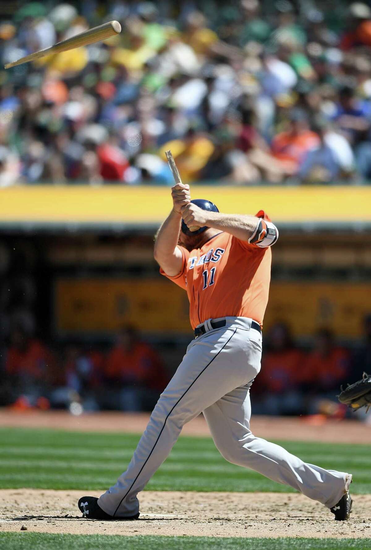 Evan Gattis shatters his bat on a fifth-inning groundout Saturday. With the bases loaded in the ninth, Gattis would hit into a game-ending 6-4-3 double play.