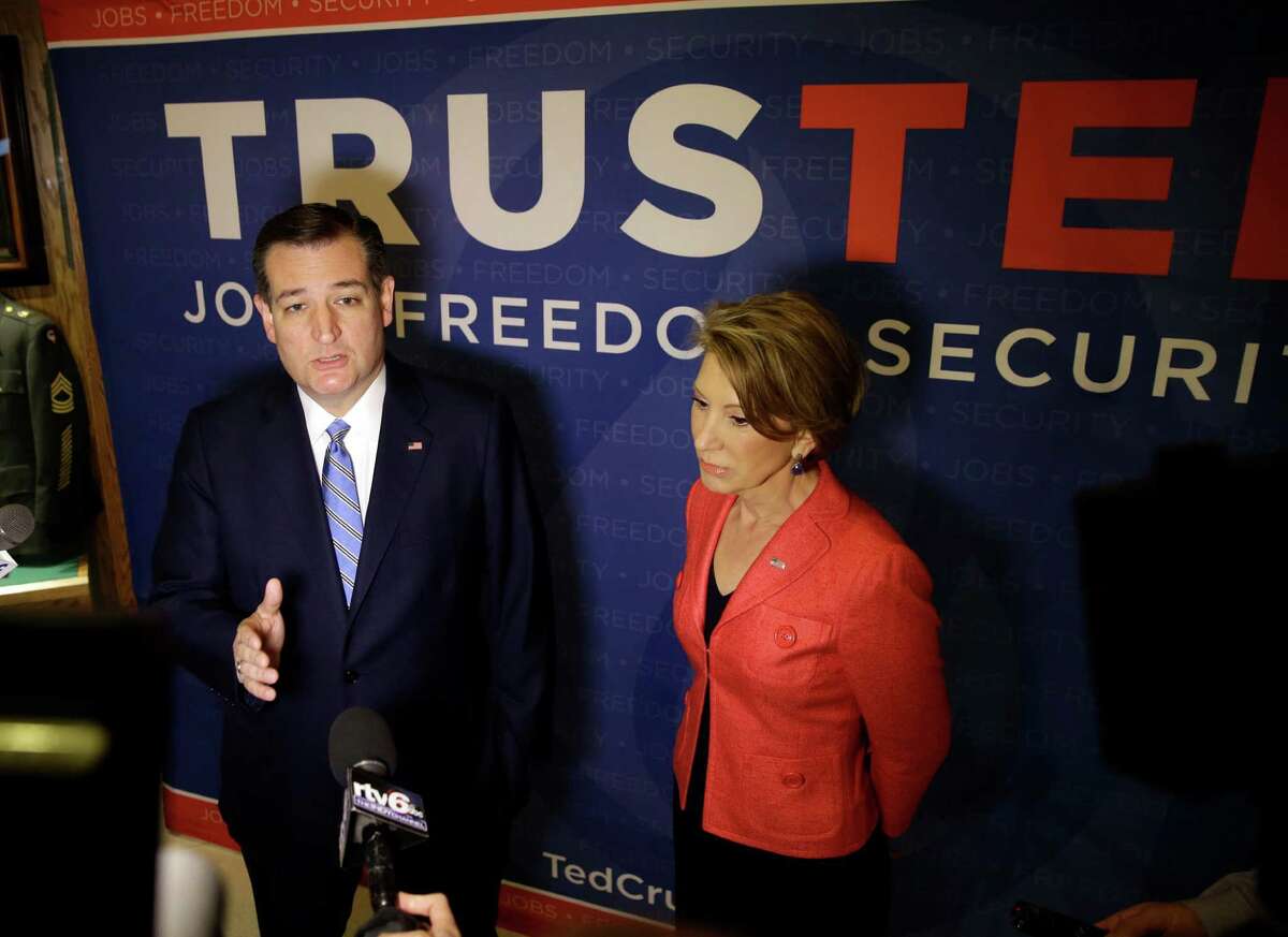 Republican presidential candidate, Sen. Ted Cruz, R-Texas, accompanied by vice-presidential candidate Carly Fiorina, speaks during a campaign stop at The Indiana War Memorial Friday, April 29, 2016, in Indianapolis. (AP Photo/Darron Cummings)