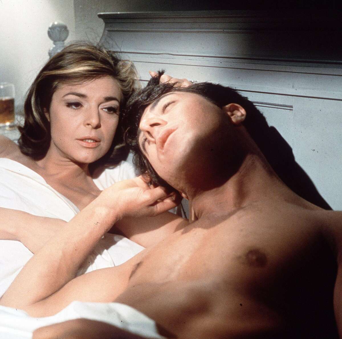 In this publicity still, actors Anne Bancroft, left, and Dustin Hoffman appear in a scene from the 1967 film "The Graduate." Bancroft, who won the 1962 best actress Oscar as the teacher of a young Helen Keller in "The Miracle Worker" but achieved greater fame as the seductive Mrs. Robinson in "The Graduate," died Tuesday June 7, 2005. She was 73. (AP Photo) Ran on: 09-11-2007 Mrs. Robinson (Anne Bancroft) and Benjamin Braddock (Dustin Hoffman) are lovers in The Graduate, the 1967 Mike Nichols film that still resonates with viewers.