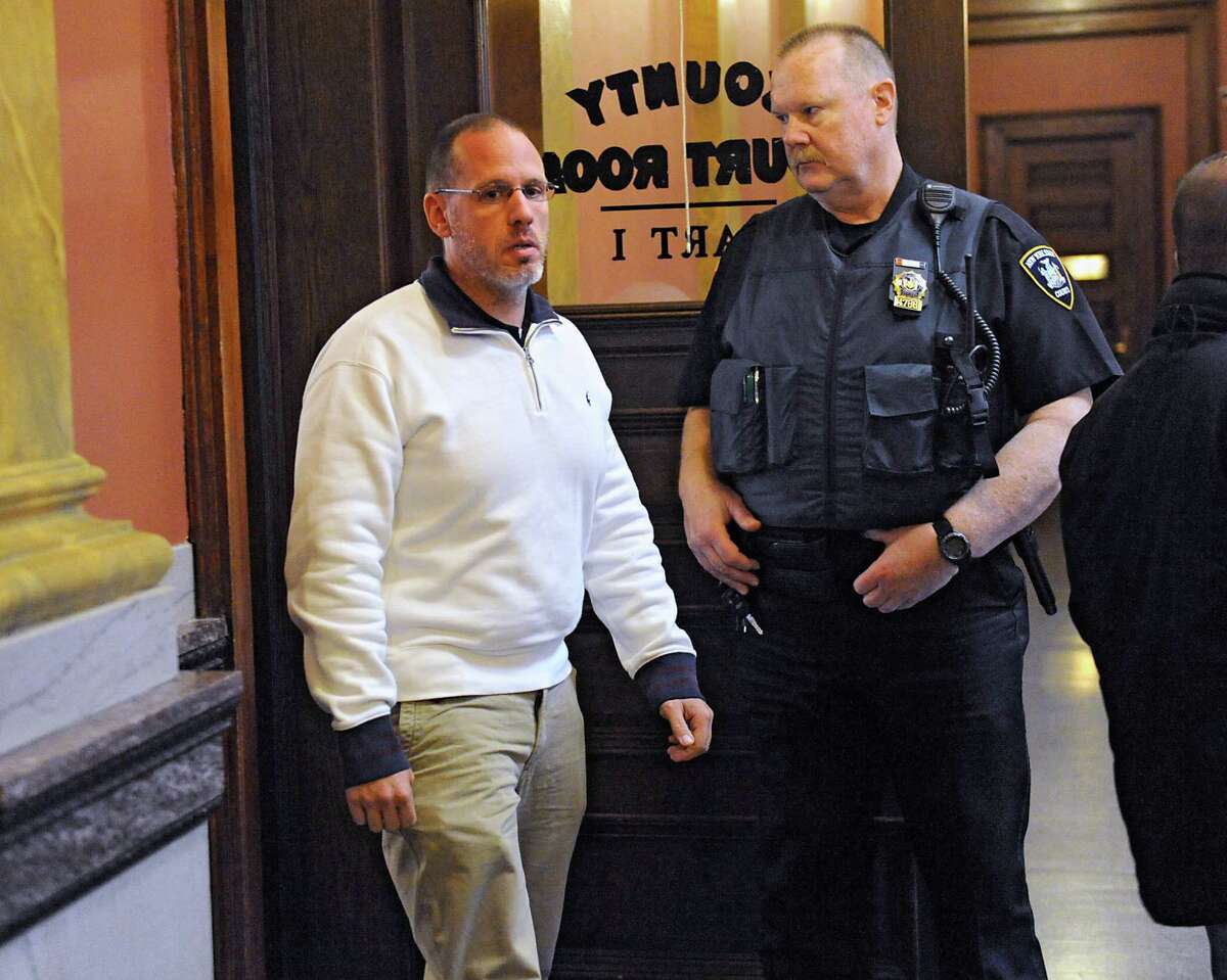 Troy police Sgt. Randall French leaves a courtroom where he was asked about the April 17 fatal shooting of a DWI as French testified in an unrelated trial at the Rensselaer County Courthouse on Monday, May 2, 2016, in Troy, N.Y. (Lori Van Buren / Times Union)