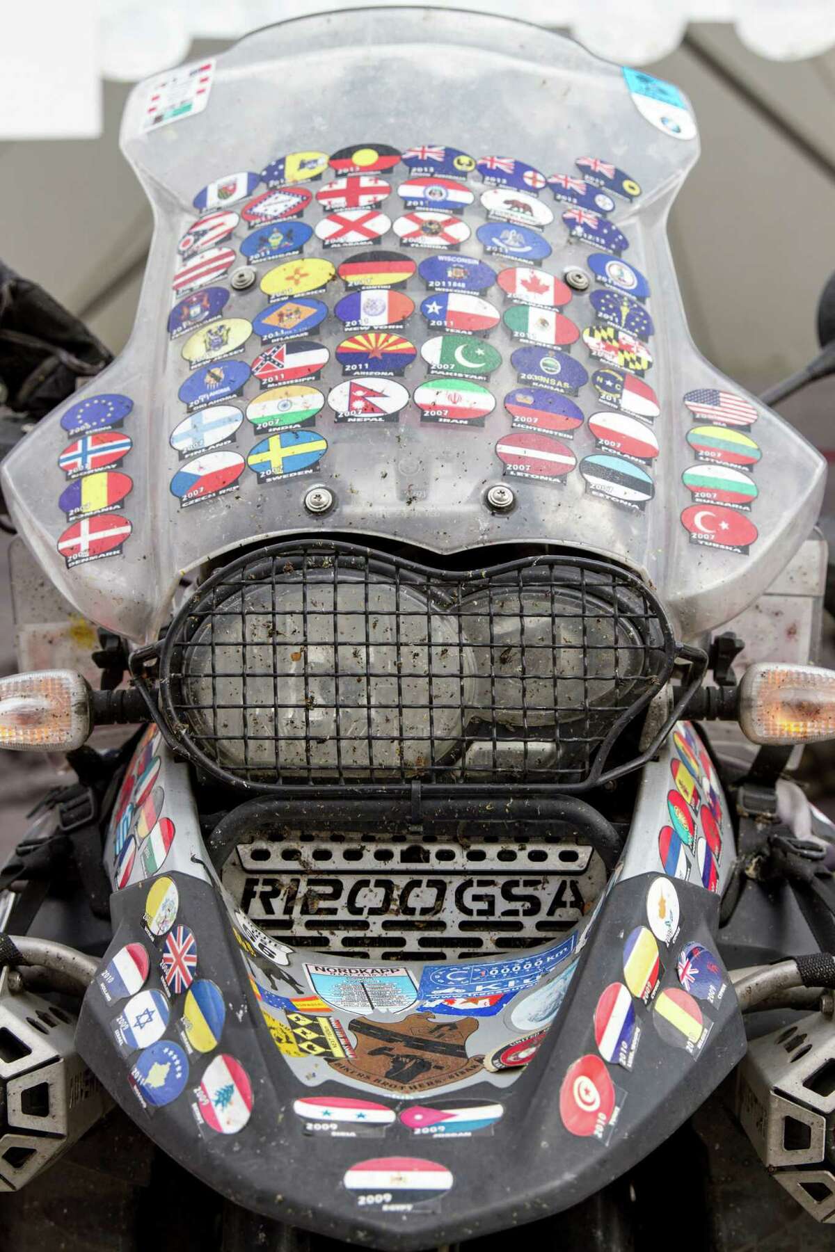 In this July 3, 2015 photo, a motorcycle ridden on a world tour is displayed at the BMW Motorrad Days in Garmisch-Partenkirchen, Germany. The annual event draws BMW enthusiasts from around the world. The 2016 event is scheduled for July 1 to 3. (AP Photo/Erik Schelzig)