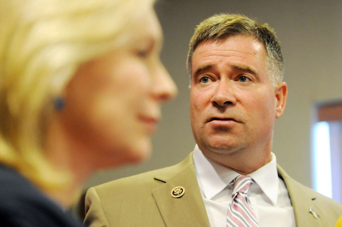 Sen. Kirsten Gillibrand, left, and Rep. Chris Gibson, right, speak during a press conference where they called for passage of legislation that would include veterans who served in the waters surrounding Vietnam among a group presumed to have been exposed to Agent Orange. They spoke on Monday, July 6, 2015, at the Joseph E. Zaloga American Legion Post 1520 in Colonie, N.Y. (Will Waldron/Times Union)