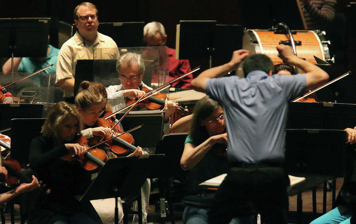 The San Antonio Symphony rehearses at the Tobin Center for the Performing Arts. The musicians seek to tell their stories on social media and have started a social media newsletter.