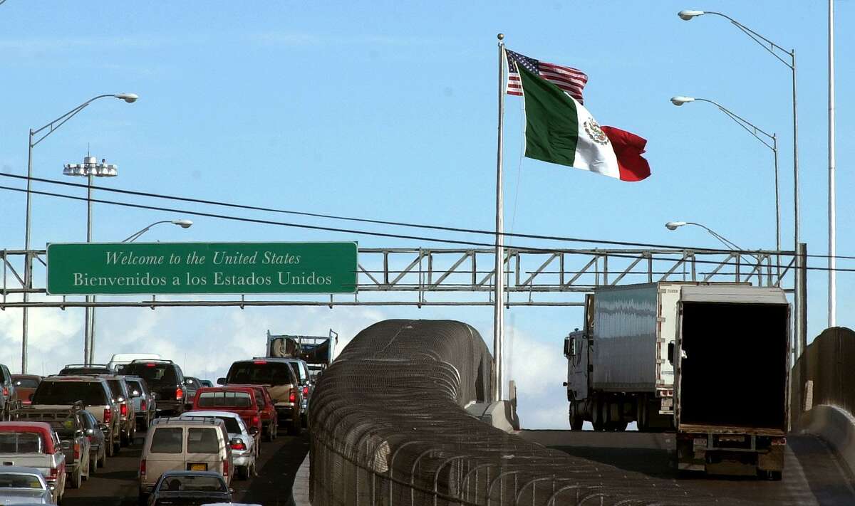 Mexican trucks drive on an international bridge leading to El Paso, Texas Wednesday, Feb. 7, 2001. Despite provisions in NAFTA, it wasn’t until the end of the Obama administration that Mexican trucks were allowed to haul loads deep into the U.S.