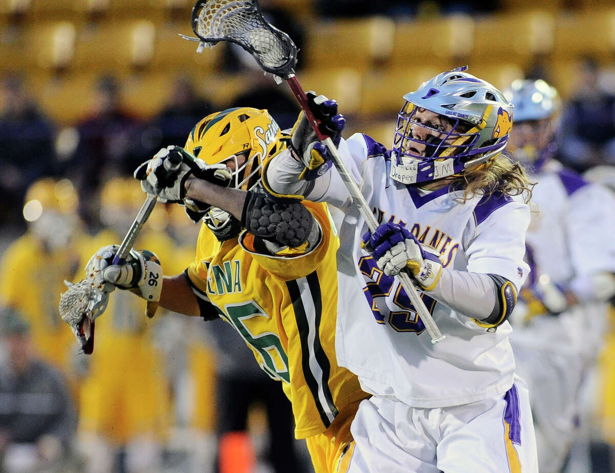 UAlbany's Zack Ornstein ,right, wins a face-off with Siena's Tyler Pantalone (26) during an NCAA Division I college men's lacrosse game on Tuesday, April 26, 2016, in Albany, N.Y. (Hans Pennink / Special to the Times Union) ORG XMIT: HP104