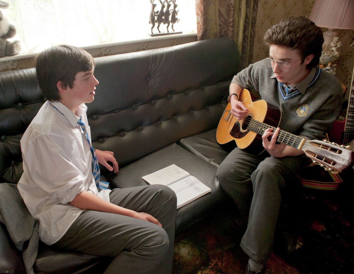 Ferdia Walsh-Peelo, left and Mark McKenna in "Sing Street." MUST CREDIT: The Weinstein Company
