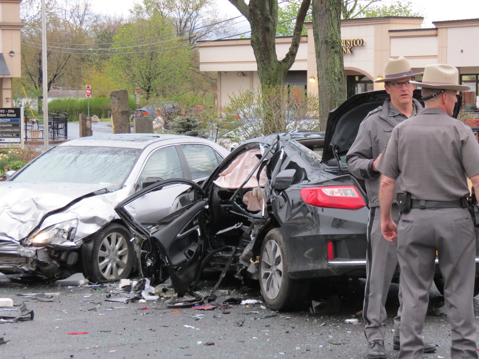 4 hospitalized after chase, 2 separate crashes