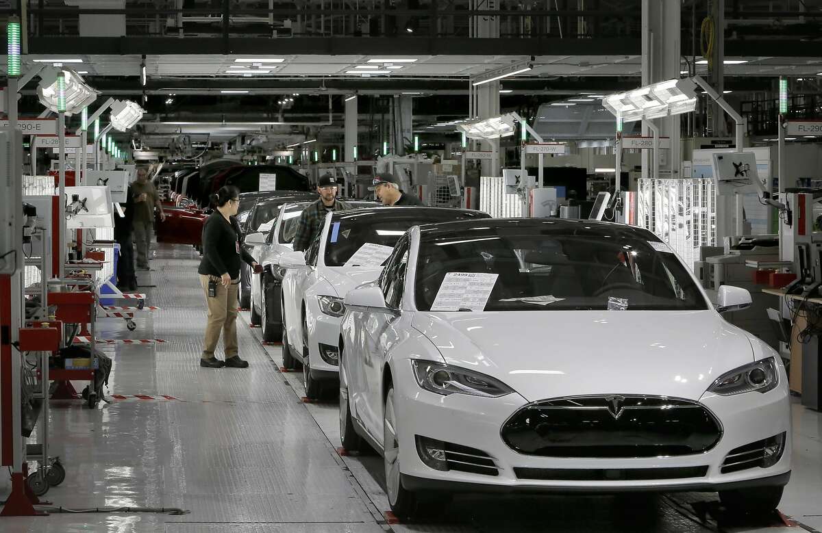 The end of the assembly line where a quality control inspection takes place at Tesla Motors, California's only full-scale auto manufacturing plant, as seen on Thurs. Feb. 19, 2015, in Fremont, Calif.