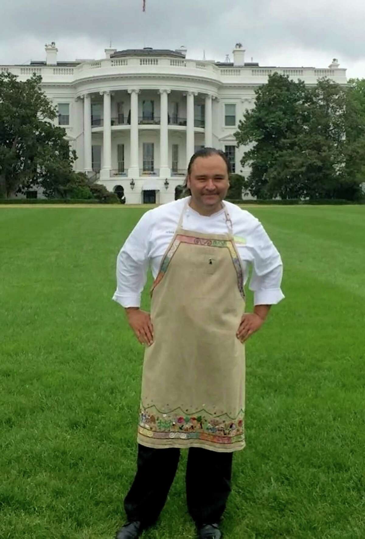 San Antonio chef Johnny Hernandez poses in front of the Whitehouse on Thursday, May 5, 2016. Hernandez created a Cinco de Mayo feast for the President and staff.