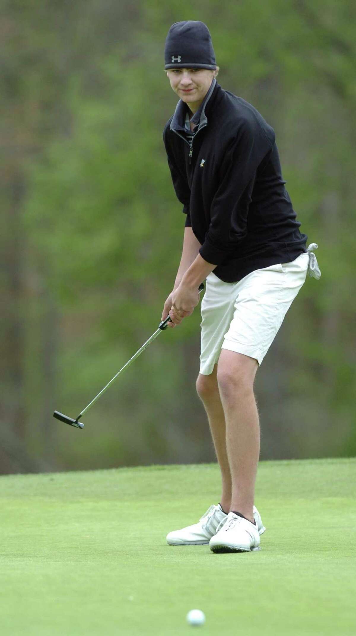 Westhill Gunnar Eriksen reacts to his putt on the 14th green during the Brian L. Fitzpatrick Memorial Tournament at Woodway Country Club in Darien on May 5, 2016. Eriksen shot an 82, taking first place and helping the Vikings win the Stamford City Schools golf title with for the second straight year.