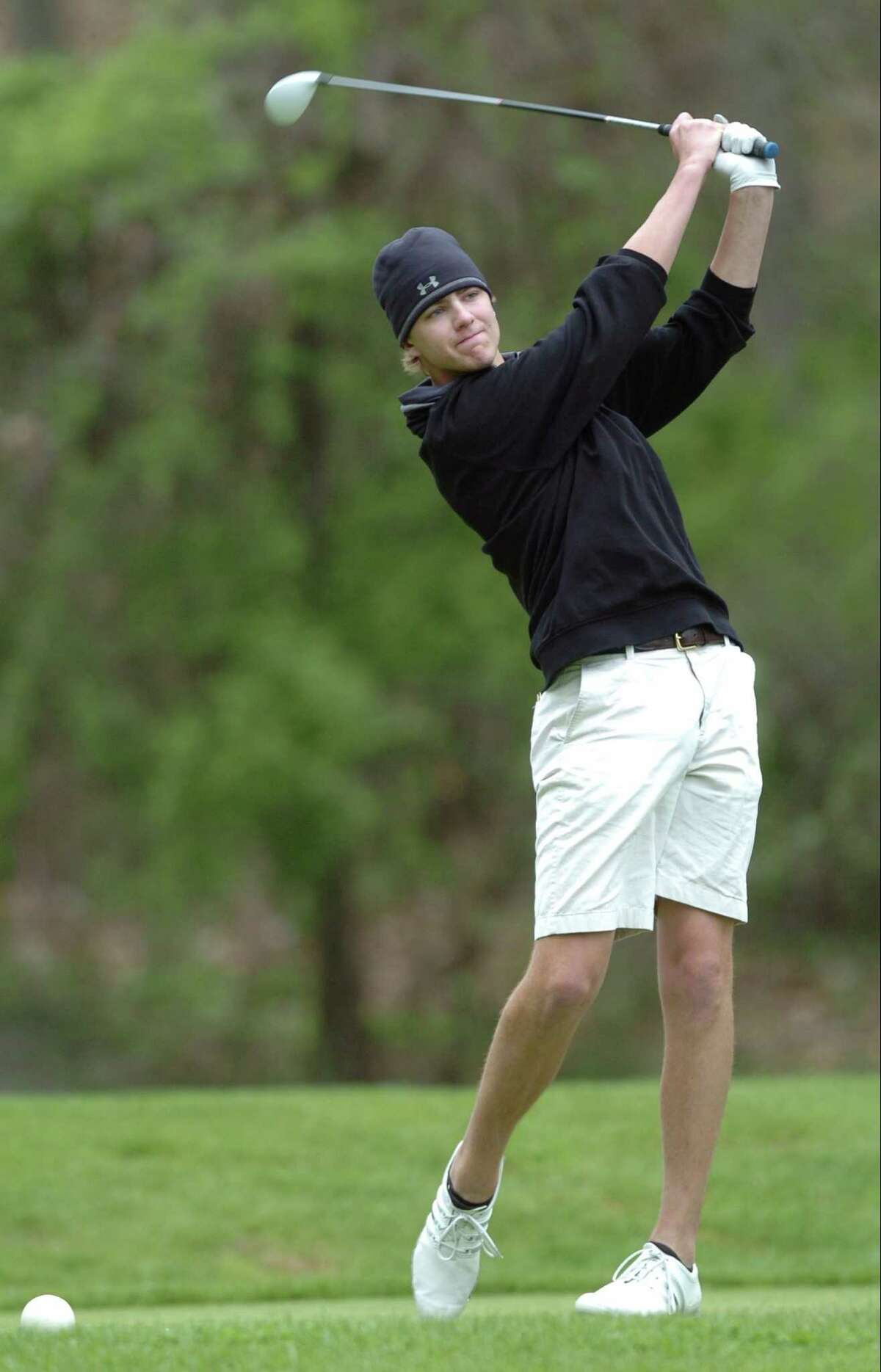 Westhill Gunnar Eriksen follows his tee shot down the 15th fairway during the Brian L. Fitzpatrick Memorial Tournament at Woodway Country Club in Darien on May 5, 2016. Eriksen shot an 82, taking first place and helping the Vikings win the Stamford City Schools golf title with for the second straight year.