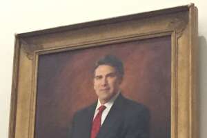 Perry Portrait makes its way onto Capitol wall, without glasses