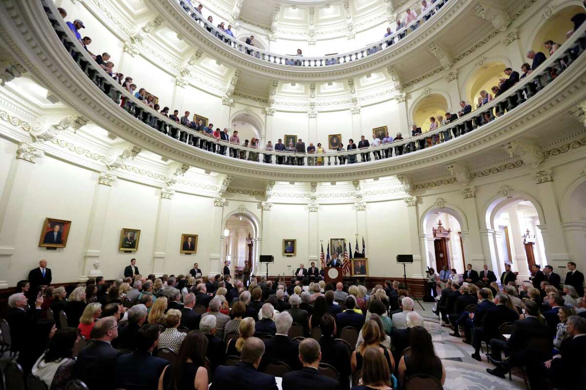 Former Texas Gov. Rick Perry speaks during ceremony for the unveiling of his official portrait in the Capitol rotunda, Friday, May 6, 2016, in Austin, Texas. (AP Photo/Eric Gay)