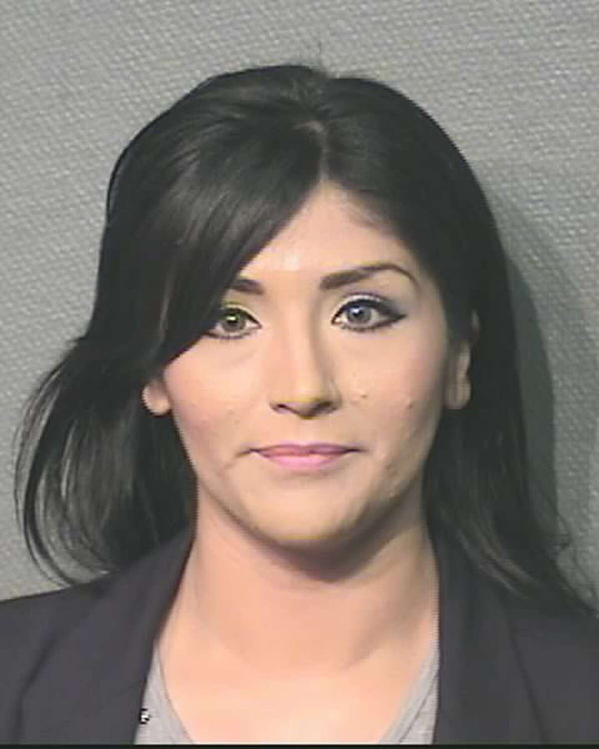 Houston police have arrested four people, including Brenda Reyes Awawde (pictured), accused of a long-running scam