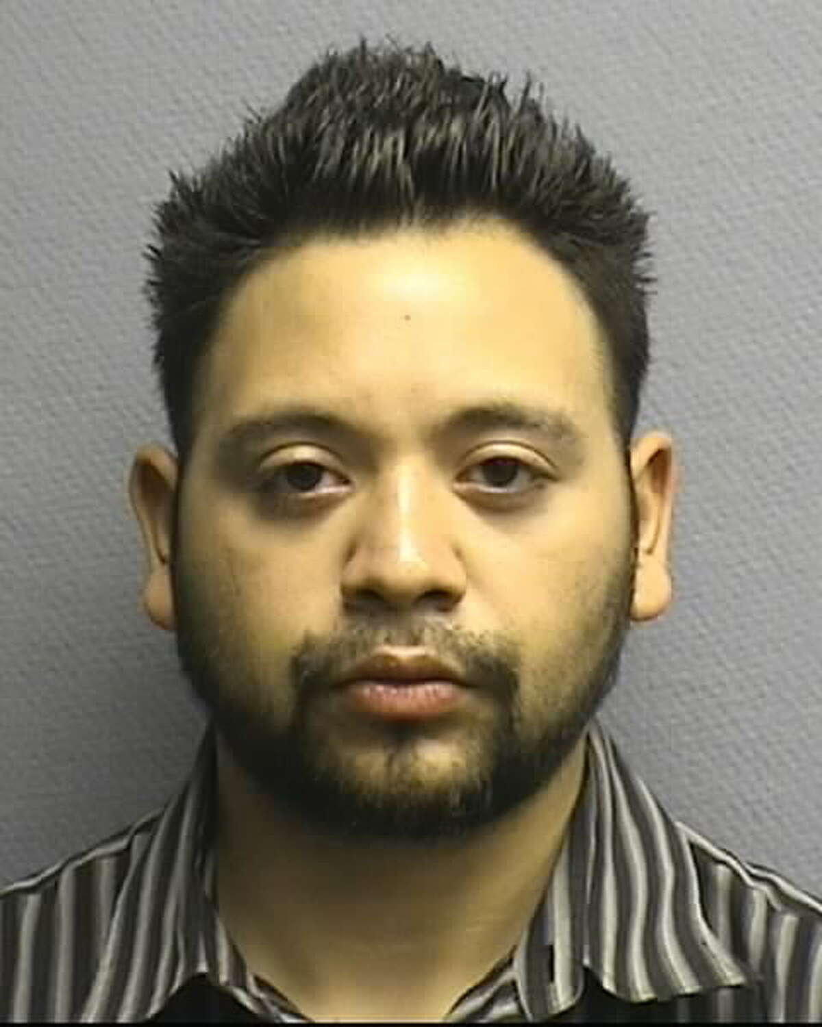 Houston police have arrested four people, including Ruben Barhona Rendon (pictured), accused of a long-running scam
