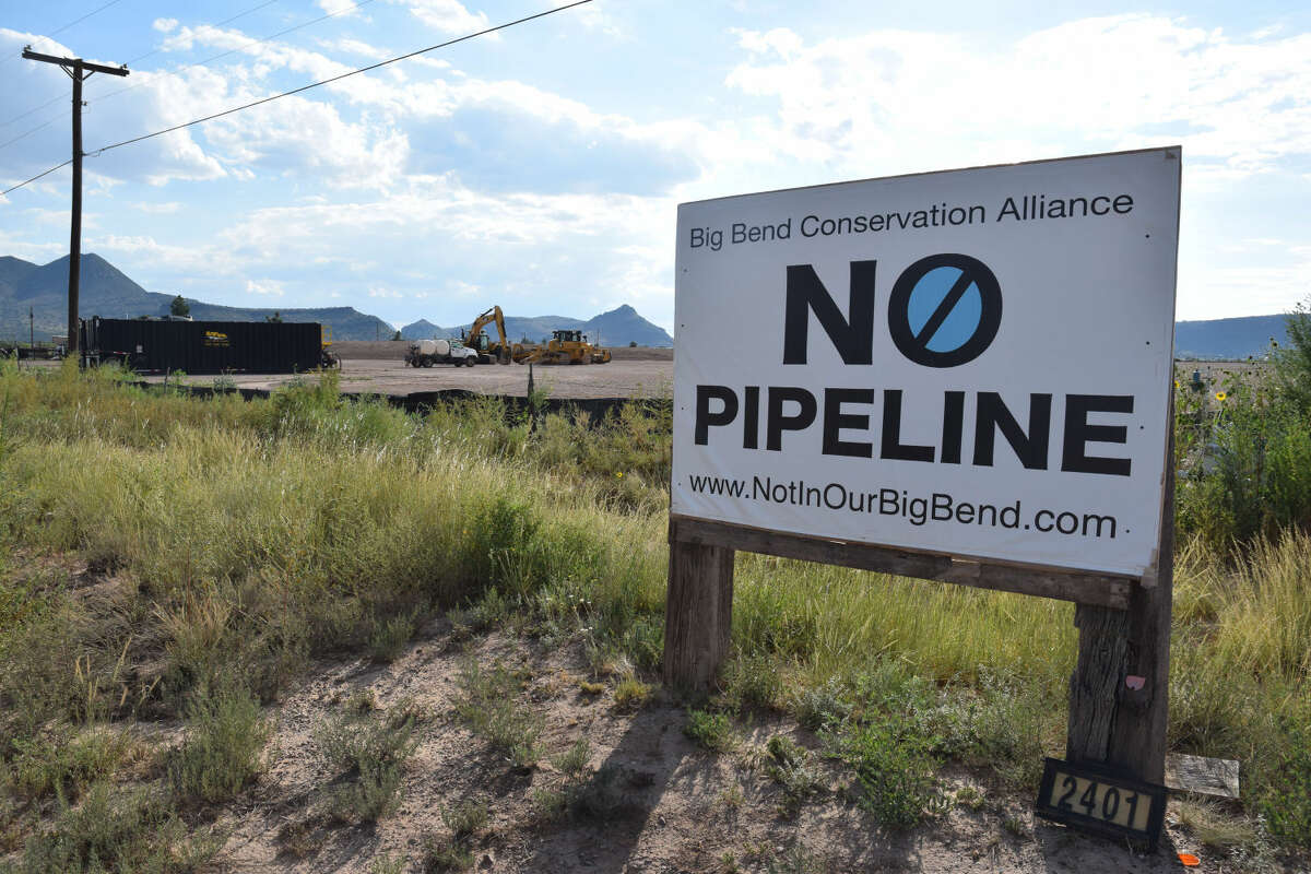 An anti-pipeline sign sits right outside of a Pumpco site in the neighborhood of Sunny Glen. Pumpco cleared the 20+ acre sight months ago in preparation to use it for the construction of the Trans-Pecos Pipeline 