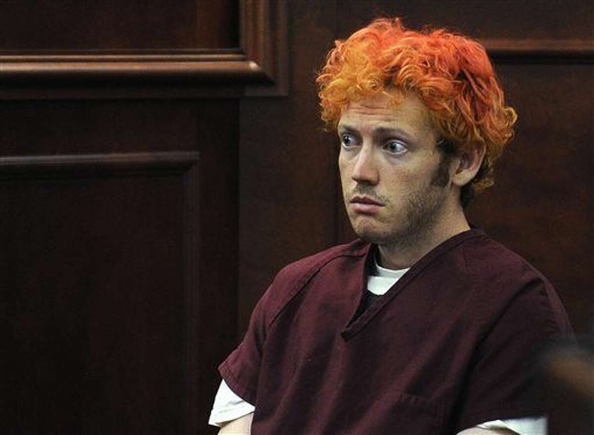 FILE - In this July 23, 2012 file photo, James Holmes, who is charged with killing 12 moviegoers and wounding 70 more in a shooting spree in a crowded theatre in Aurora, Colo., in July 2012, sits in Arapahoe County District Court in Centennial, Colo. Holmes' trial is set to start on Tuesday, Jan. 20, 2015. (AP Photo/Denver Post, RJ Sangosti, Pool, File)