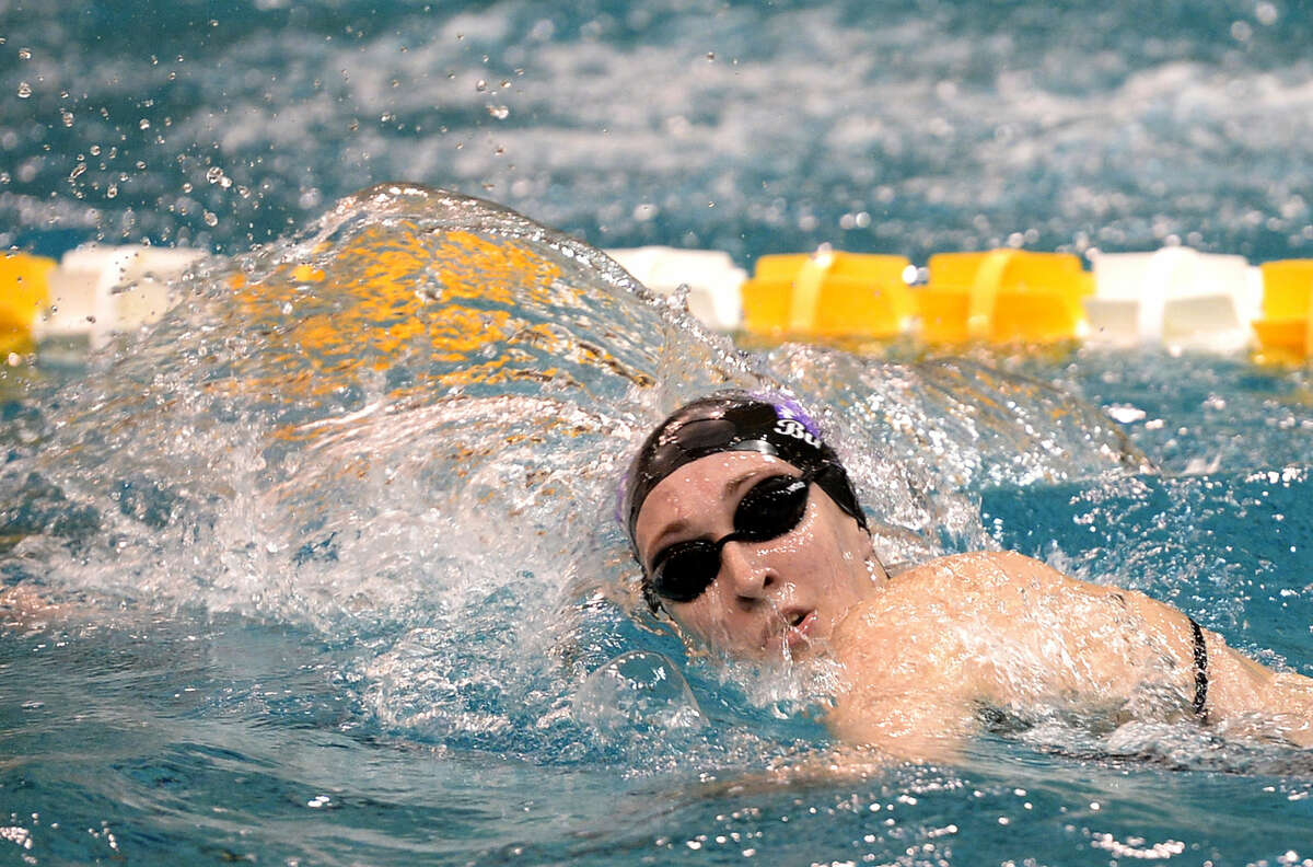 Midland High's Dailey Parker competes in the women's 200 yard freestyle event during the District 3-6A swimming and diving meet on Saturday, Jan. 3, 2016 at the Mabee Aquatic Center. James Durbin/Reporter-Telegram