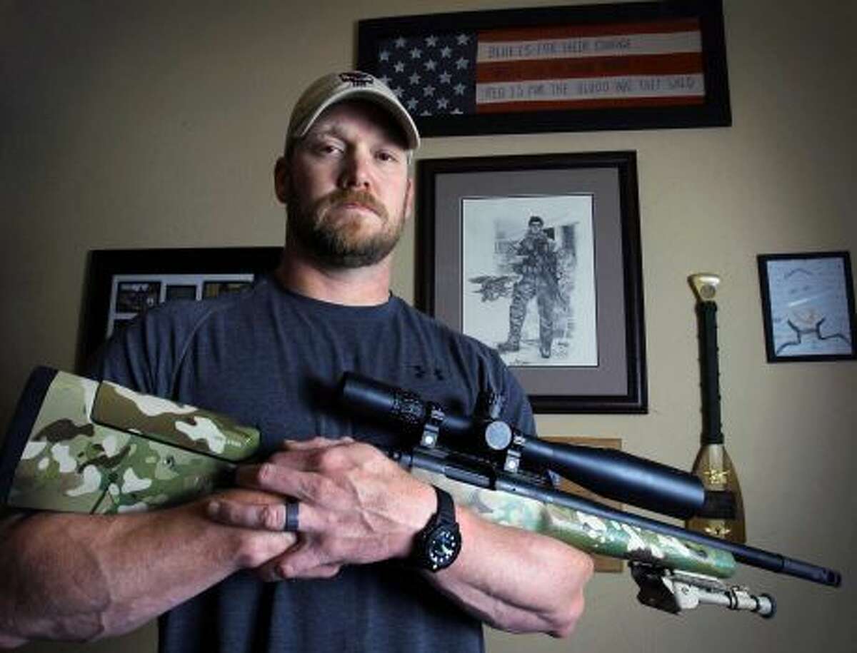 In this April 6, 2012, file photo, Chris Kyle, a former Navy SEAL and author of the book "American Sniper," poses in Midlothian.