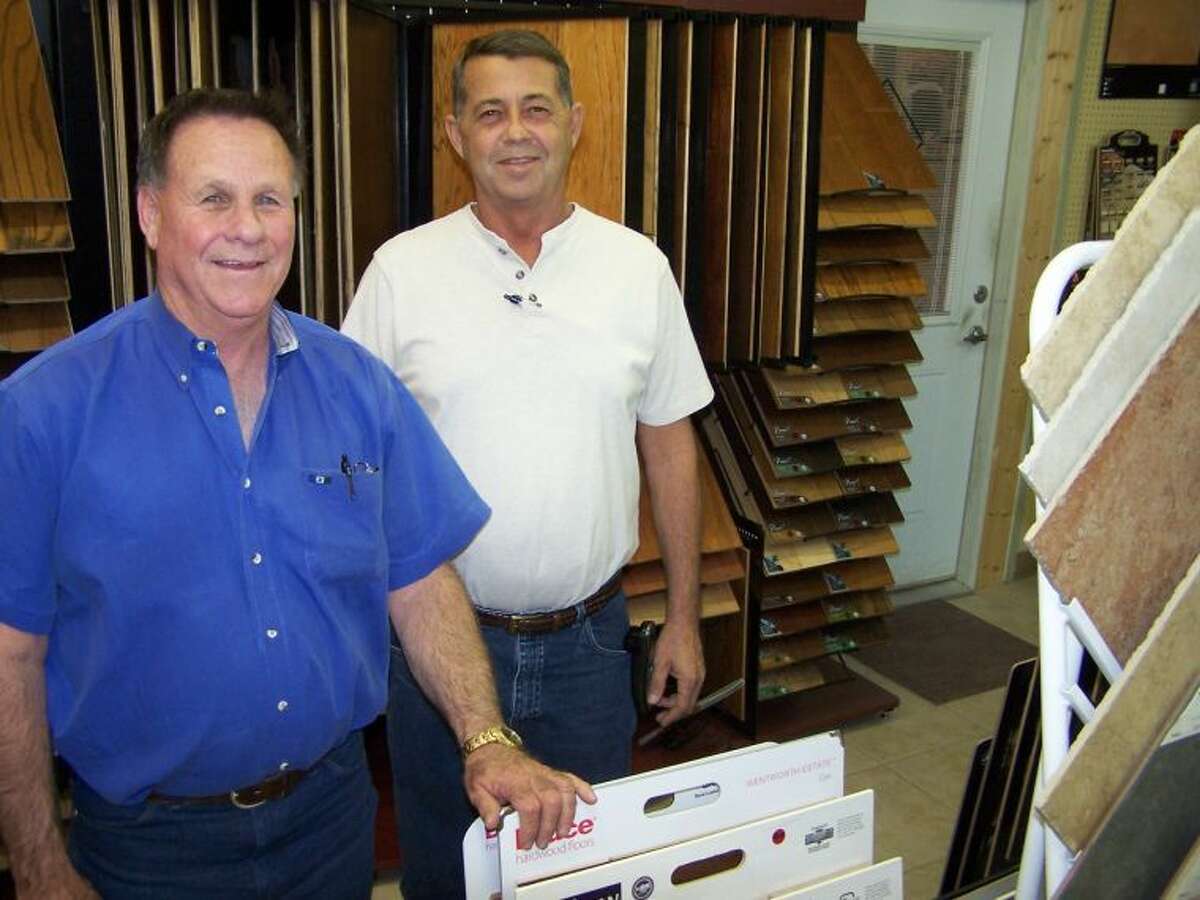 Travis Kendrick, left, and Tebo Vaughn say summer is a great time to replace flooring. See them at Southwest Floors, 1113 Andrews Highway in Midland.