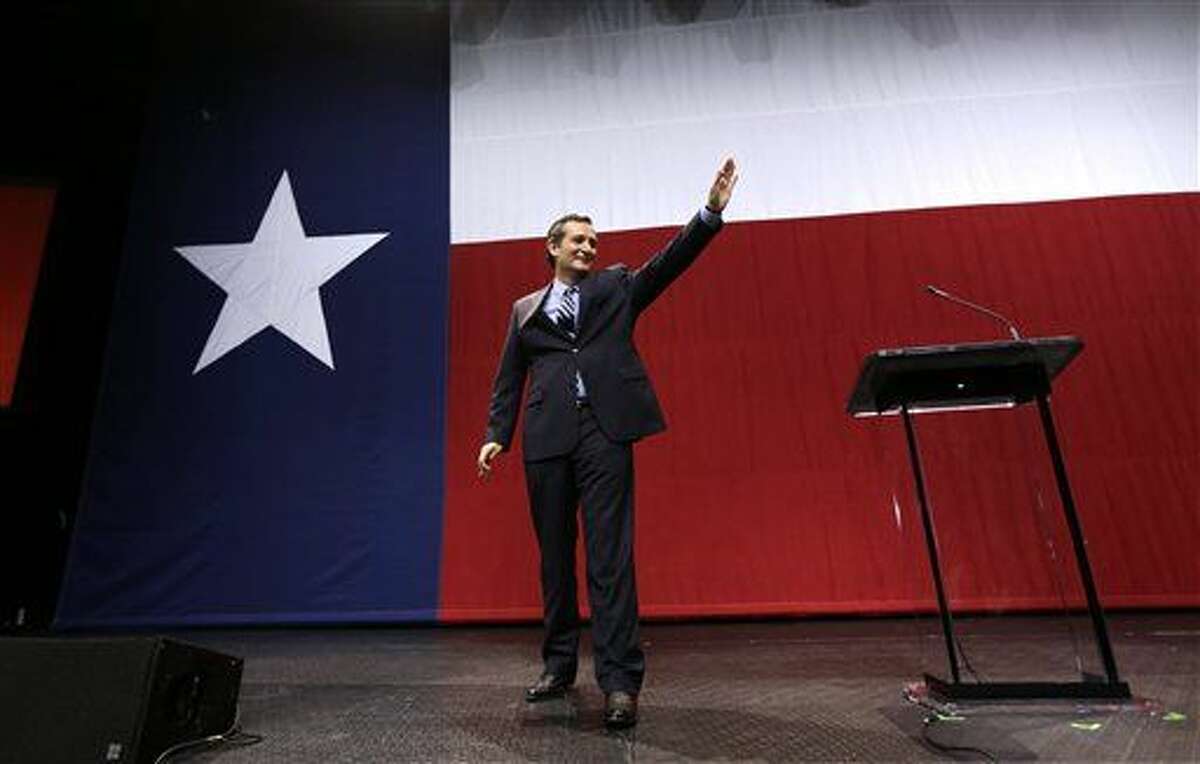 U.S. Sen. Ted Cruz, R-Texas, waves to the crowd at a Republican victory party Tuesday, Nov. 4, 2014, in Austin, Texas. (AP Photo/David J. Phillip)