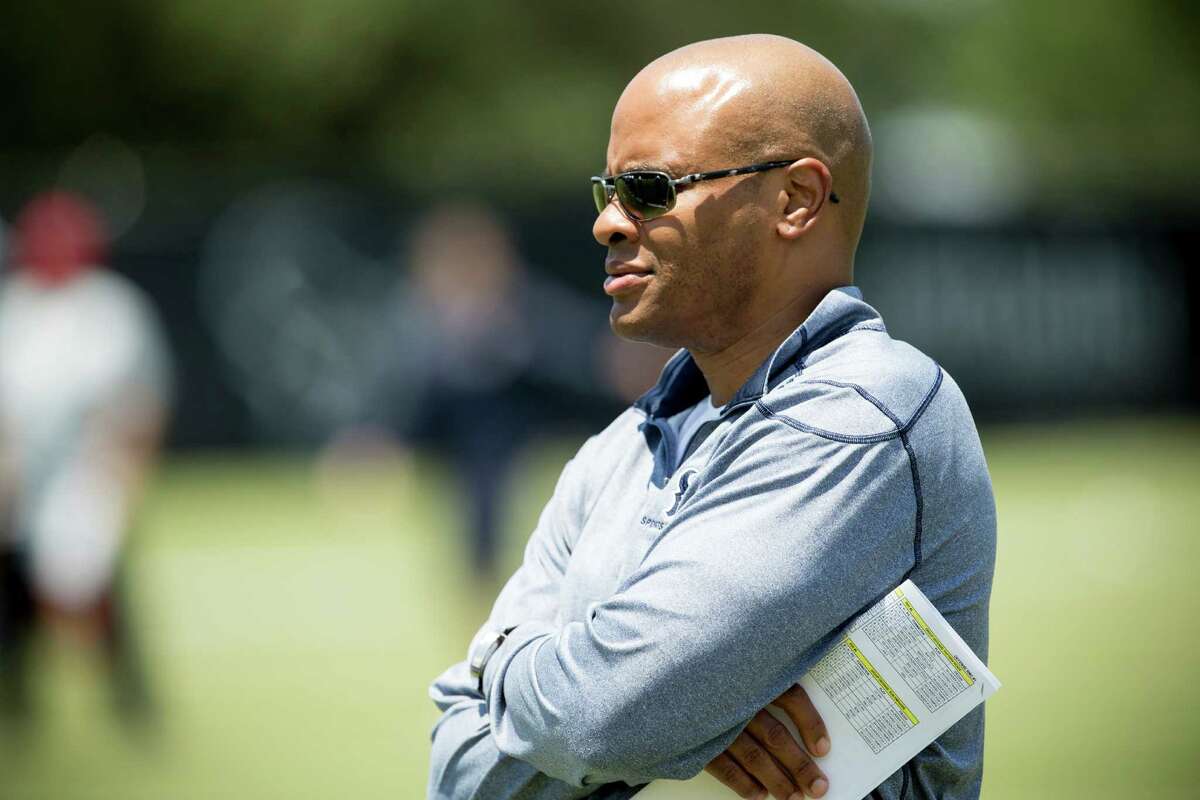 Houston Texans general manager Rick Smith, watching the team at rookie minicamp, will have his contract extended through 2020. Click through the gallery to see where Smith ranked in last year's NFL GM rankings by the Chronicle.