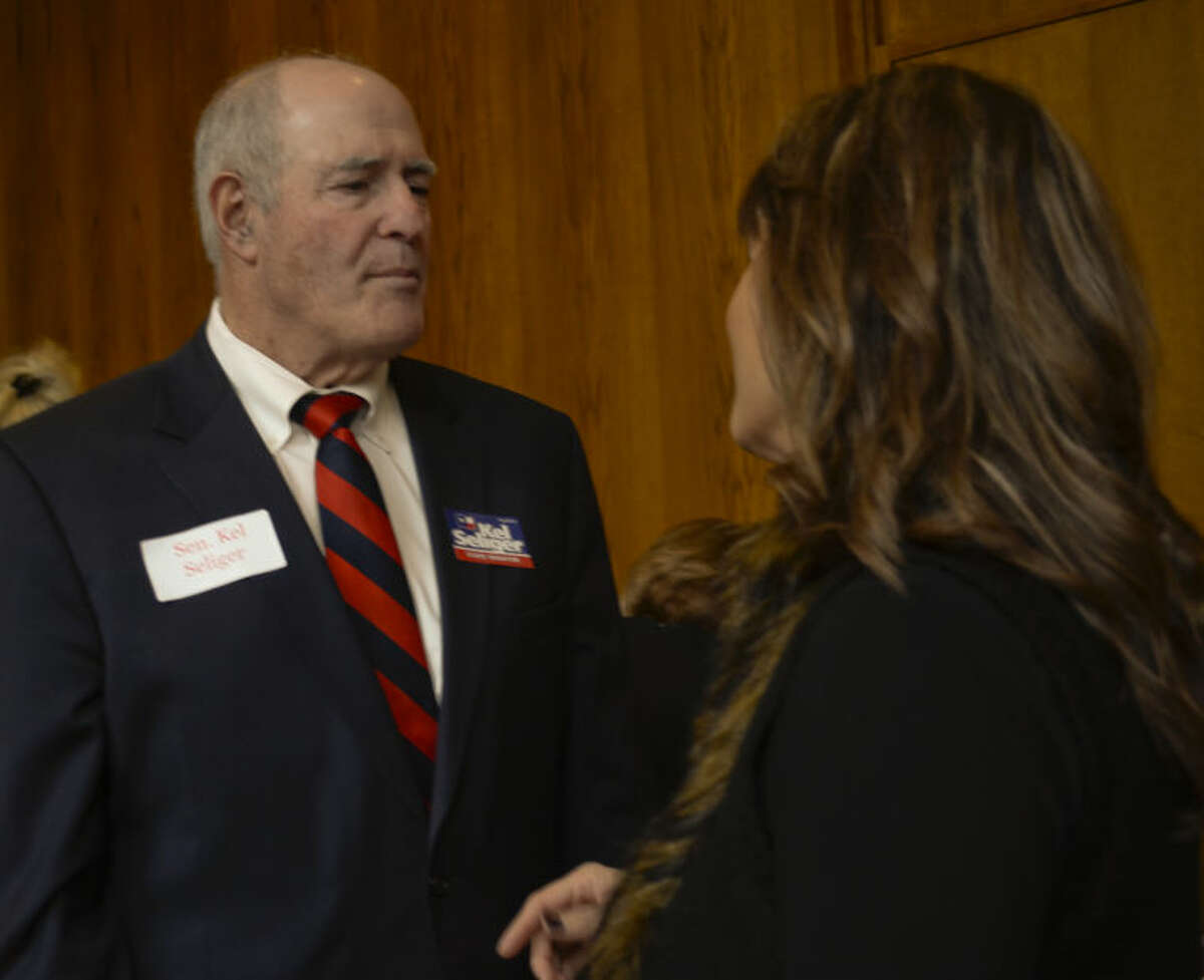 Senator Kel Seliger talks with Eva Salcido Wednesday at the Midland County Republican Women's luncheon. Tim Fischer\Reporter-Telegram
