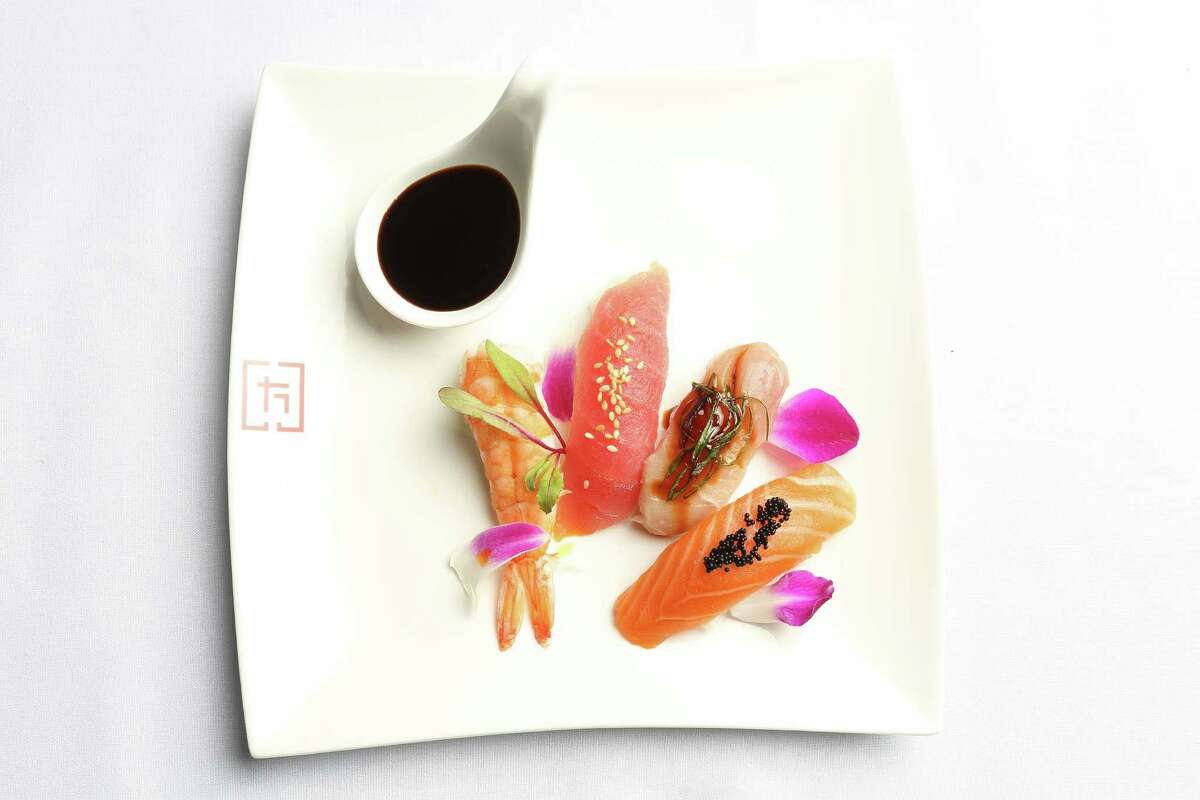 Assorted nigiri sushi (shrimp, tuna, hamachi and salmon)