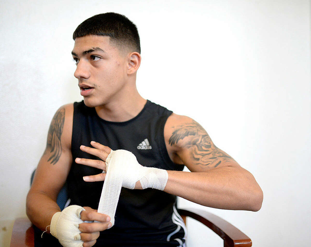 Michael Dutchover, a senior at Midland High, photographed while training Thursday, March 17, 2016, at the Clayton Williams Boxing Center. Dutchover won the Texas Golden Gloves boxing title in the 132-pound division. James Durbin/Reporter-Telegram