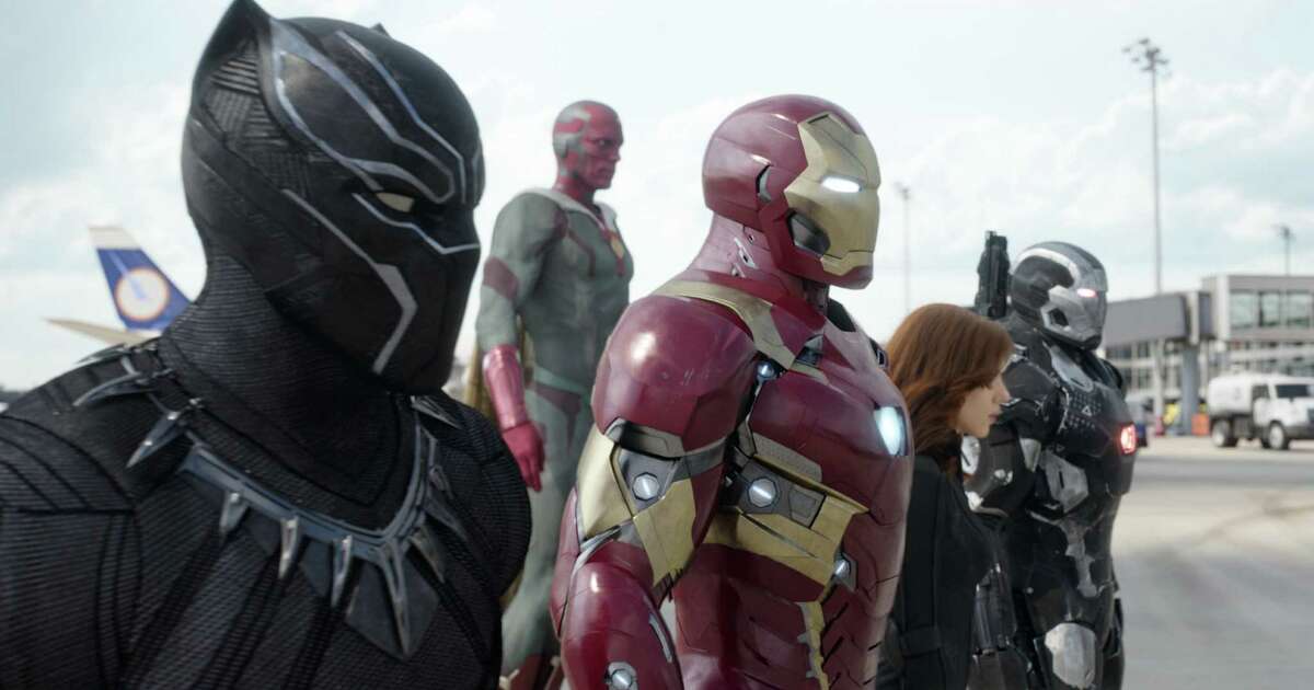 This image released by Disney shows, from left, Chadwick Boseman as Panther, Paul Bettany as Vision, Robert Downey Jr. as Iron Man, Scarlett Johansson as Natasha Romanoff, and Don Cheadle as War Machine in a scene from "Marvel's Captain America: Civil War." (Disney Marvel via AP)
