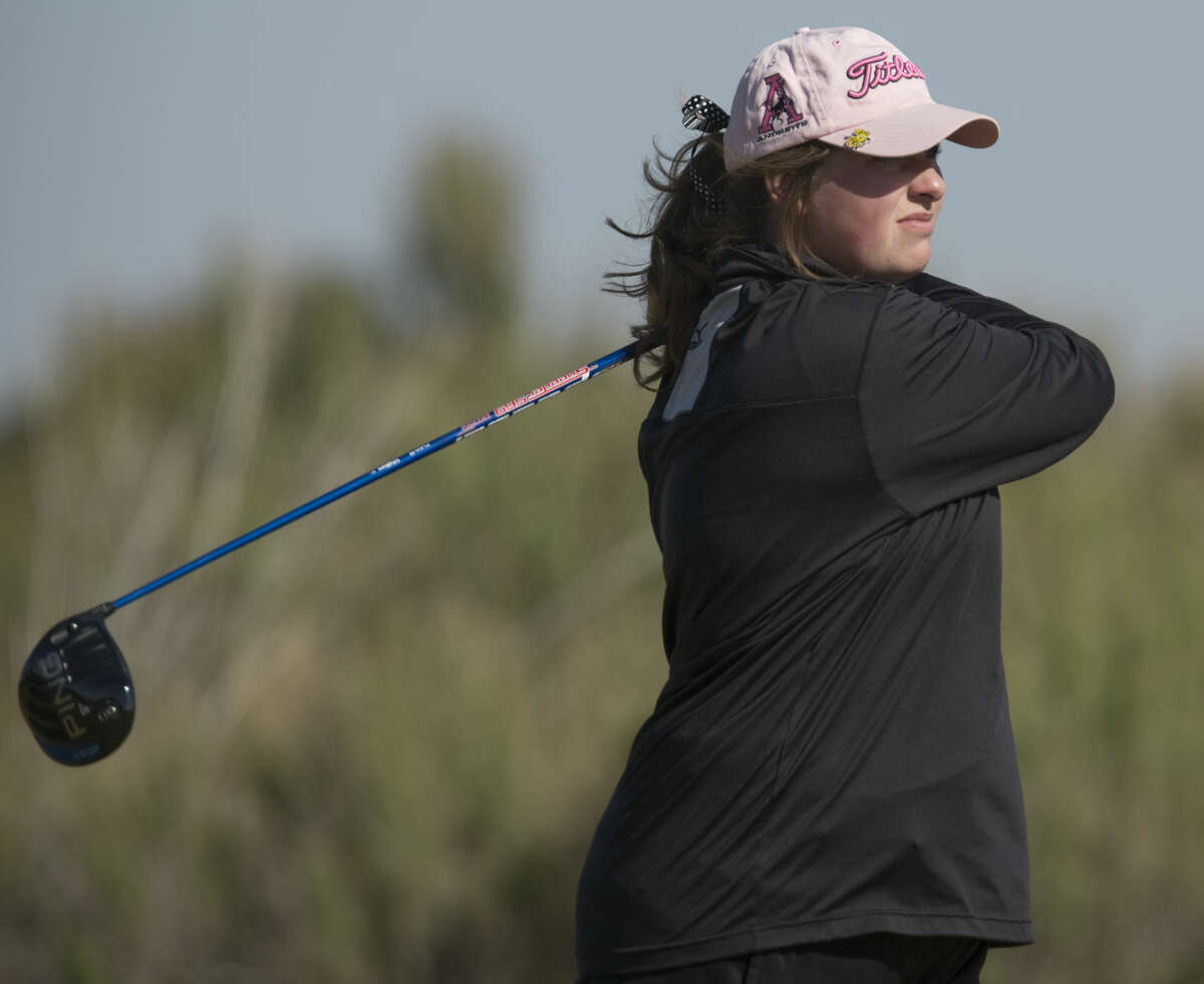 Andrews' Madee McAllister follows her shot Monday 03-28-16 at the second round of the District 4-4A golf tournament at Hogan Park Golf Course. Tim Fischer\Reporter-Telegram