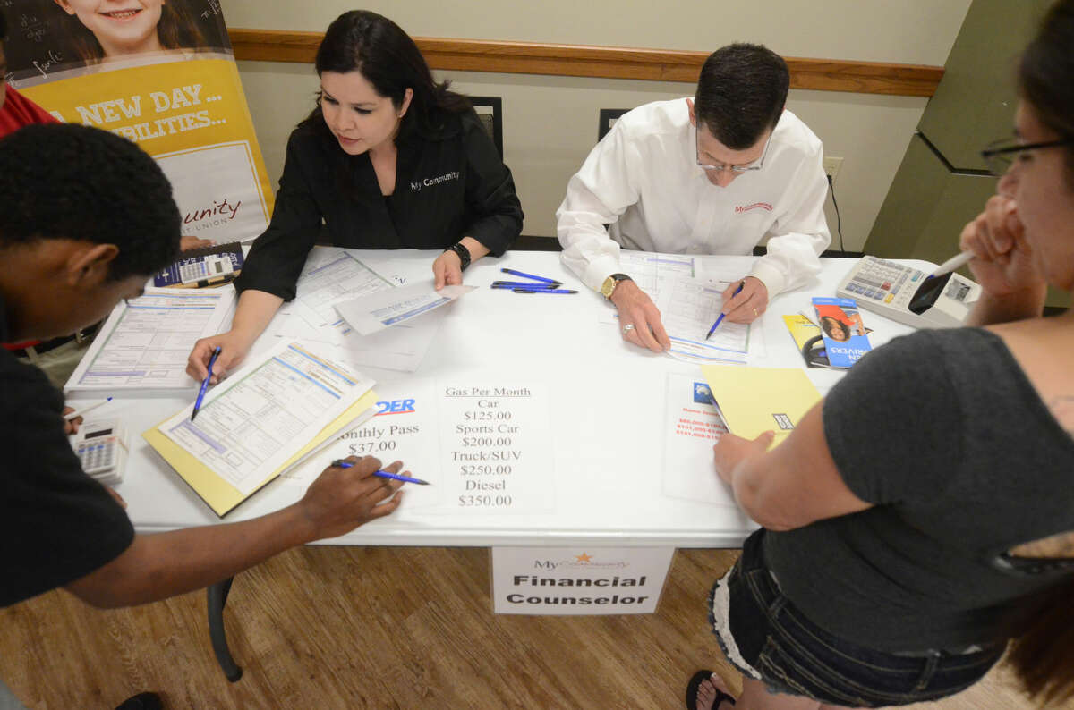 Families involved in Family Promise of Midland participated in a hands-on workforce and financial management training seminar Thursday, May 7, 2015 at Shared Spaces. James Durbin/Reporter-Telegram