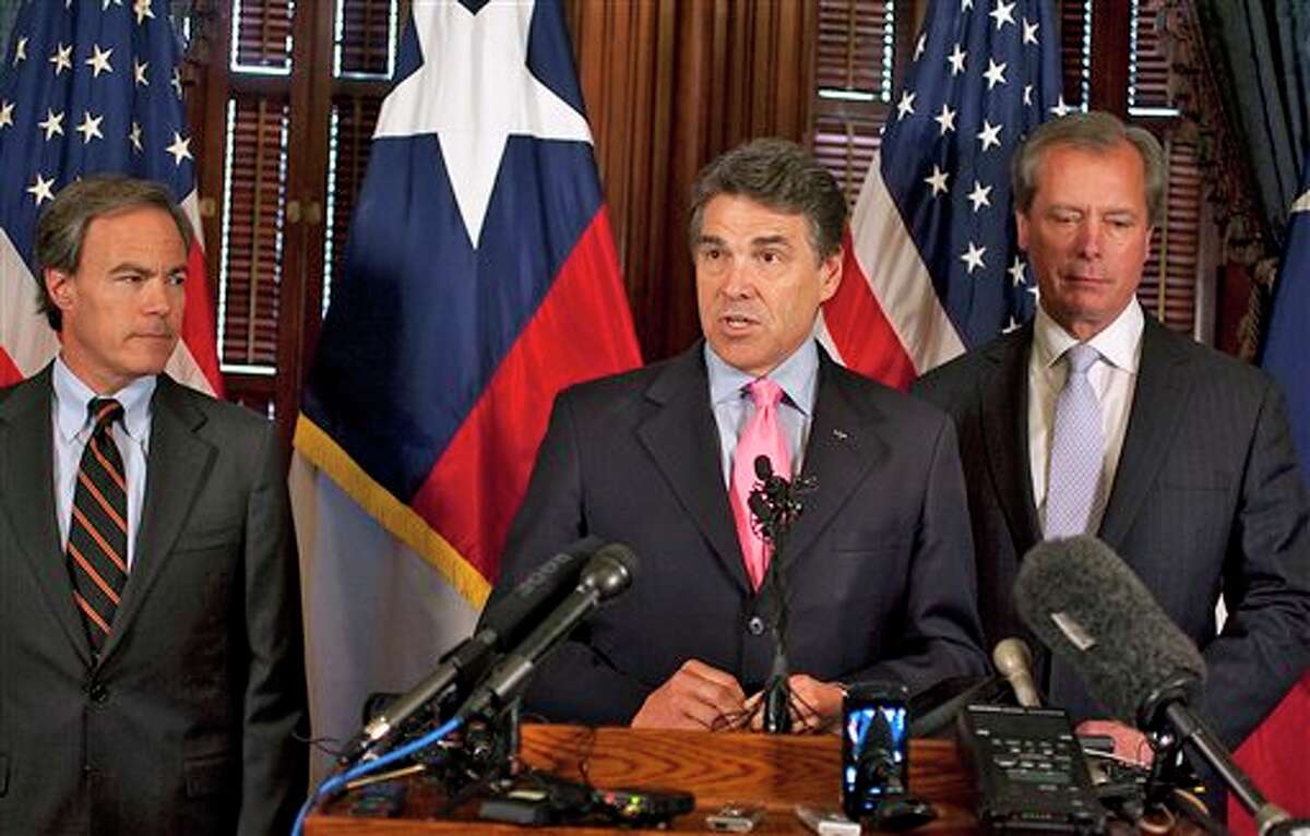 File - In this May 31, 2011 file photo, Texas Gov. Rick Perry, center, Speaker of the House, Joe Straus, left, and Lt. Gov. David Dewhurst, right, speak to members of the media at the State Capitol in Austin, Texas. When Gov. Rick Perry announced his bid for the presidency last year, dozens of Republican politicians in Texas recalculated their career plans for a post-Perry Texas. Now that Perry has abandoned his bid for the White House, ambitious Texas politicians are adjusting their plans. (AP Photo/Austin American-Statesman, Rodolfo Gonzalez)