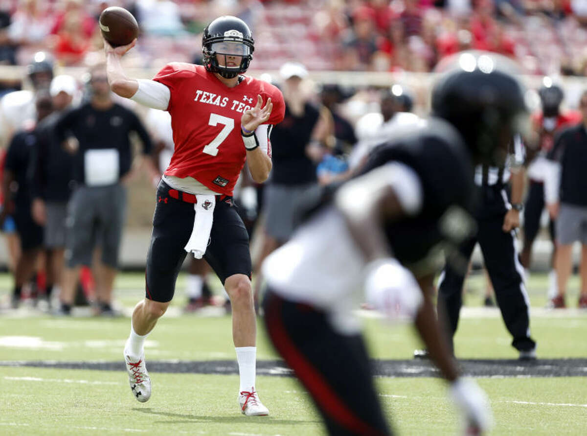 Texas Tech's Davis Webb (7) throws a pass during a spring NCAA college football game Saturday, April 12, 2014, in Lubbock, Texas. (AP Photo/The Avalanche-Journal, Tori Eichberger)
