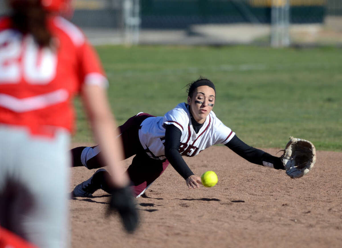 Lee High's Ciara Sheppard (5) dives for the ball during the game against Lubbock Coronado on Tuesday at Gene Smith Field. James Durbin/Reporter-Telegram
