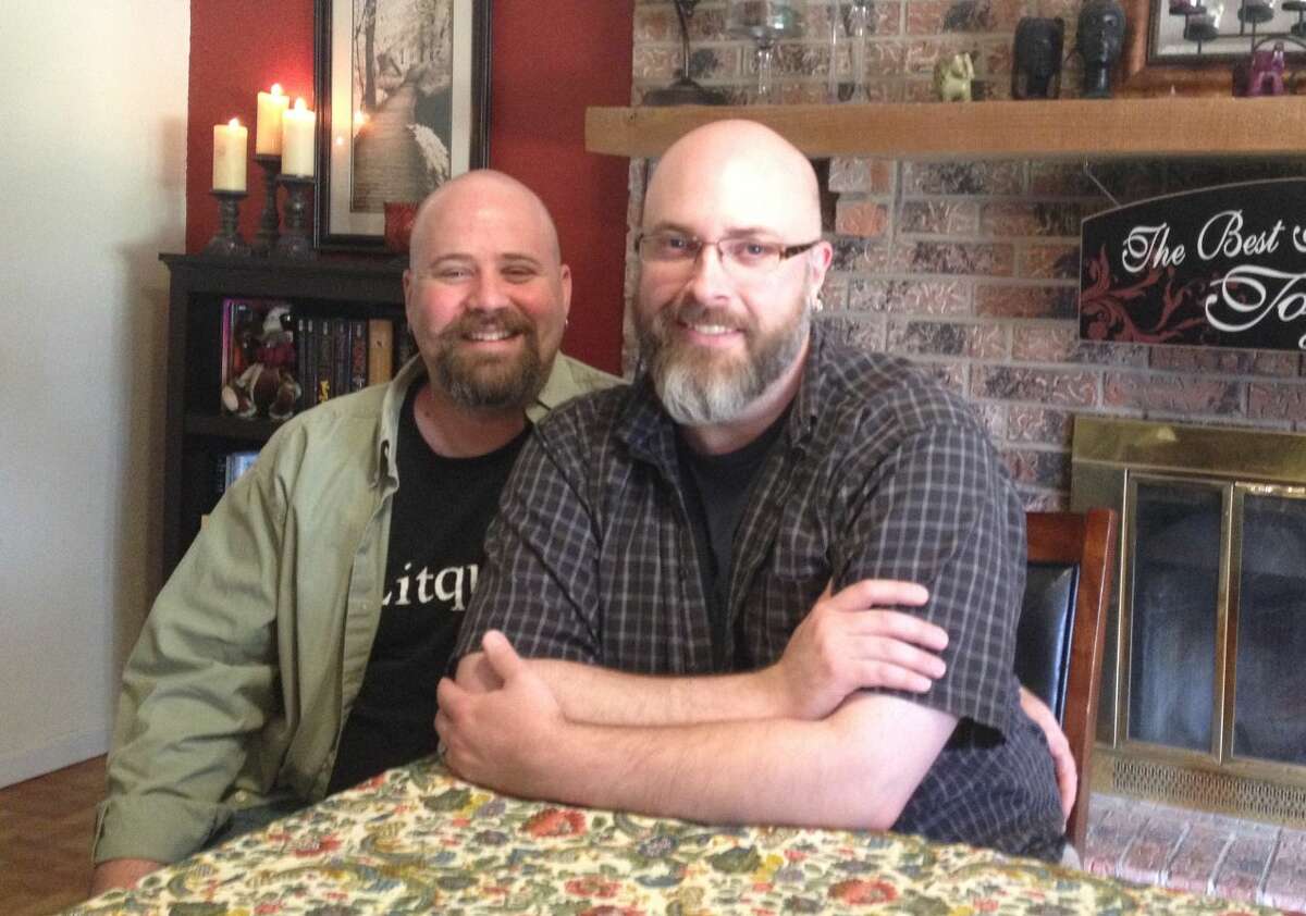 James, left, and Micheal Willhelm-Waid in their home. The two sat with the Reporter-Telegram to answer questions about the recent SCOTUS decision.