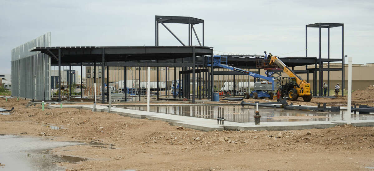 Construction continues Tuesday, 6-30-15, on the Red Oak Plaza, near Sams Club off Loop 250. Tim Fischer\Reporter-Telegram